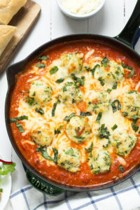 Spinach Chicken Parmesan Meatballs in Creamy Tomato Sauce by Spoonful of Flavor