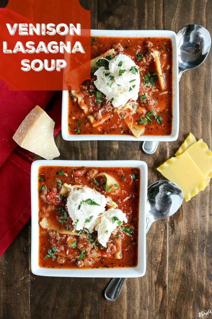 overhead shot of 2 white bowls filled with venison lasagna soup, topped with ricotta