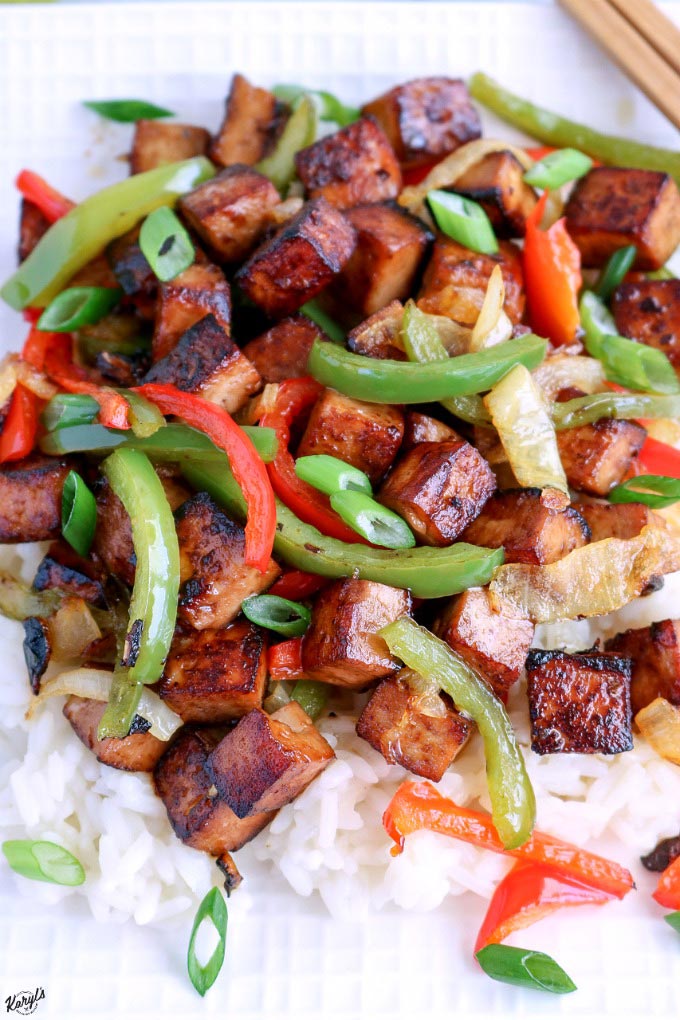 Tofu Bell Pepper Stir Fry will wake up your taste buds with a delicious marinade, gorgeous char on the tofu and a combination of bell peppers and onions. Perfect on its own for a gluten free meal, or serve over rice #tofu #bellpeppers #marinade #stirfry #vegetables #vegetarian #meatless #glutenfree #meatlessmonday #karylskulinarykrusade Tofu Bell Pepper Stir Fry will wake up your taste buds with a delicious marinade, gorgeous char on the tofu and a combination of bell peppers and onions. Perfect on its own for a gluten free meal, or serve over rice #tofu #bellpeppers #marinade #stirfry #vegetables #vegetarian #meatless #glutenfree #meatlessmonday #karylskulinarykrusade