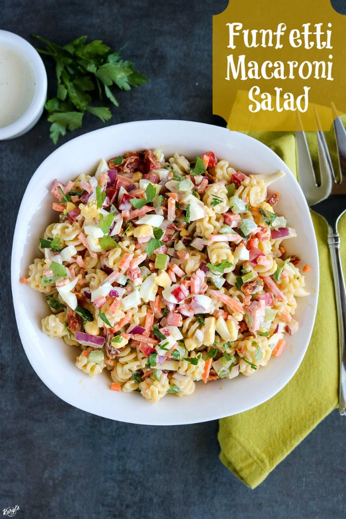 overhead shot of finished macaroni salad with a green napkin on the side