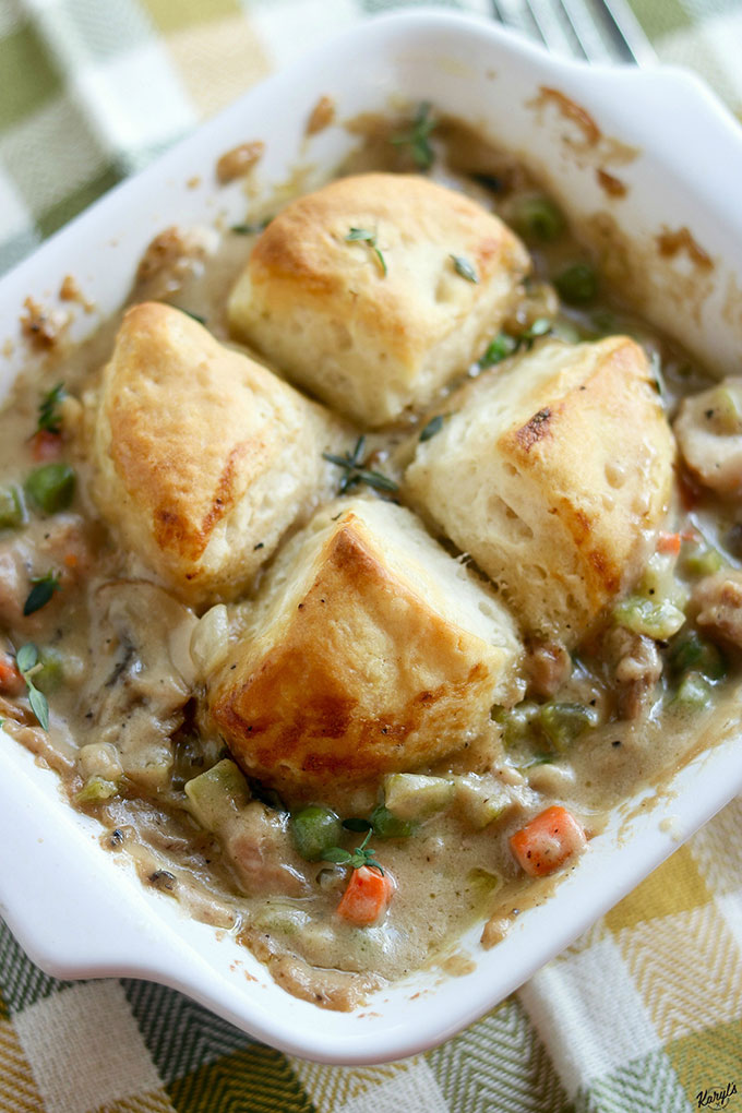 Chicken Pot Pie is a classic comfort food! Skip the canned "cream of" soups and make the filling from scratch in minutes. Topped with biscuits and baked to golden perfection, this dish is perfect to warm you up #chicken #biscuits #chickpenpotpie #comfortfood #homemadesauce #ovenbaked #karylskulinarykrusade Chicken Pot Pie is a classic comfort food! Skip the canned "cream of" soups and make the filling from scratch in minutes. Topped with biscuits and baked to golden perfection, this dish is perfect to warm you up #chicken #biscuits #chickpenpotpie #comfortfood #homemadesauce #ovenbaked #karylskulinarykrusade