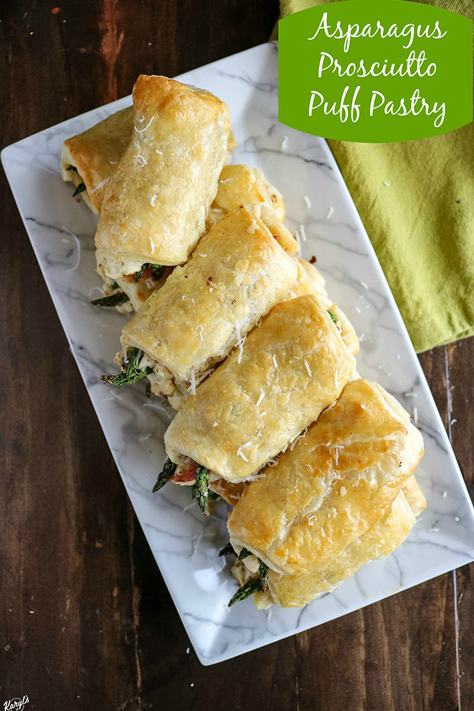 finished Asparagus Prosciutto Puff Pastry on a serving dish, displayed at an angle, with napkin in top right corner
