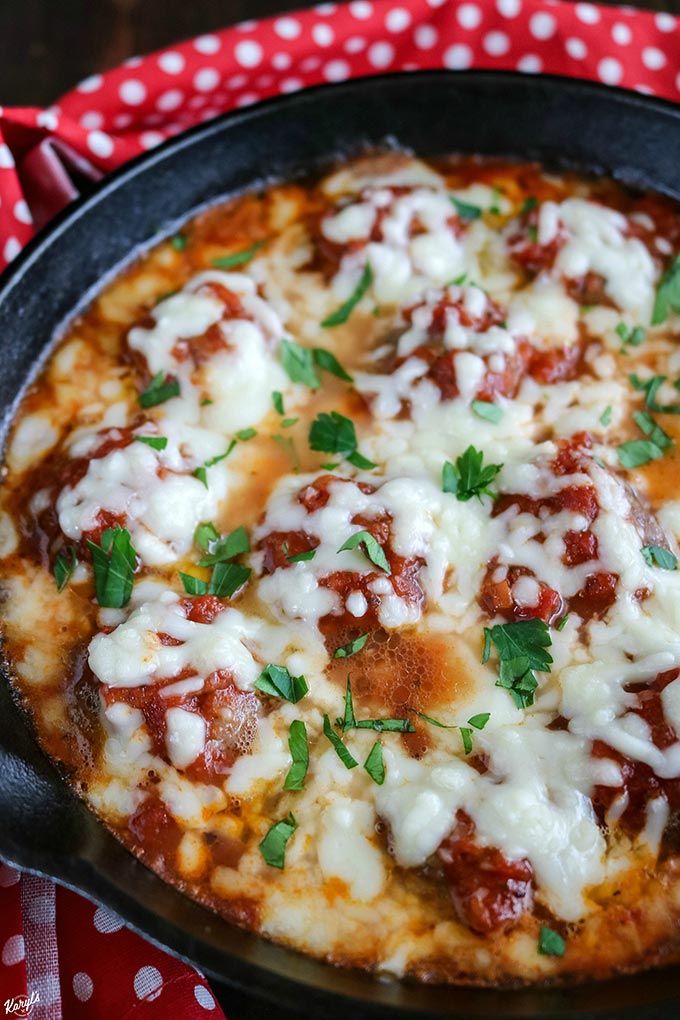 close up shot of finished meatball skillet bake