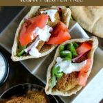 overhead shot of 2 Falafel pita sandwiches with a bowl of Falafel on the side