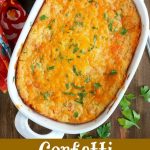 overhead shot of finished confetti corn casserole in a white baking dish