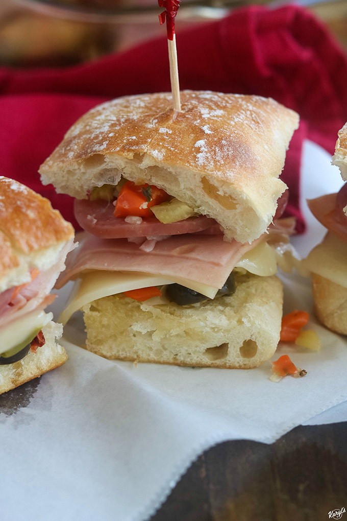 close up shot of Hot Muffaletta Slider on white paper