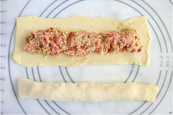 overhead process shot: sausage rolls in wrapping process