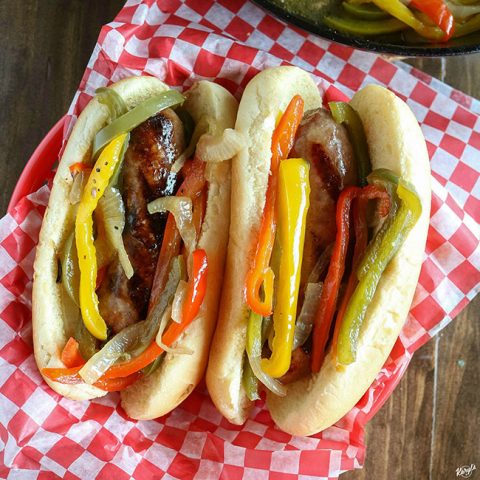 overhead shot of finished brats in a basket