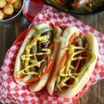 overhead shot of finished brats in a basket