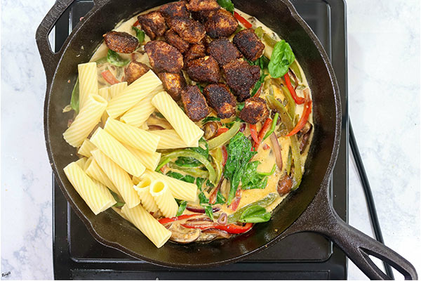 Overhead process shot: all ingredients in a cast iron skillet