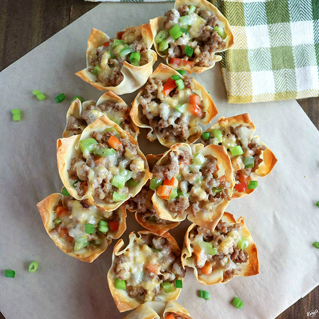 overhead shot of a stack of finished Sausage Pepper Wonton Cups
